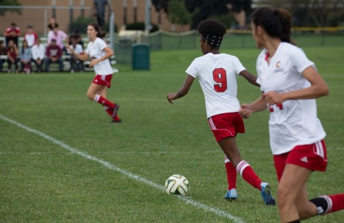 Lady Cardinals Come Close in Dramatic Match versus Holy Cross College